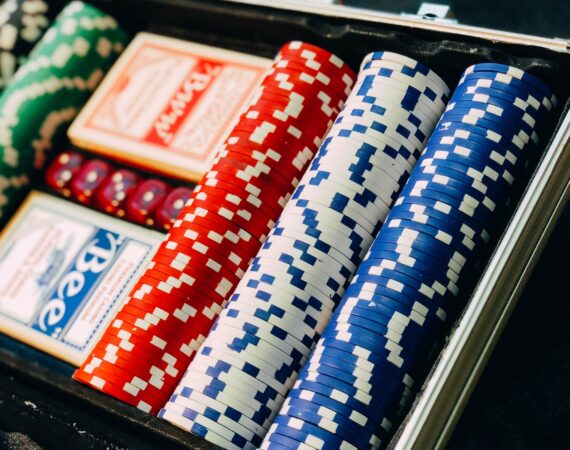 closeup photography of poker chip set