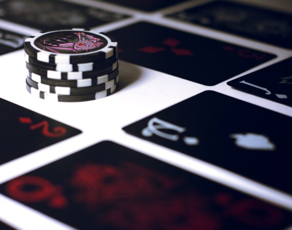 poker chip on white surface